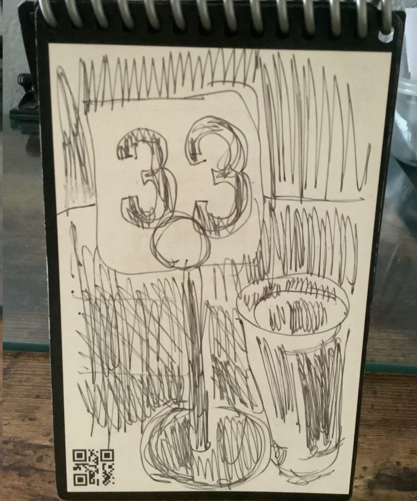 pen an ink drawing of number 33 and water glass in the dark